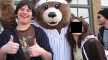 Boy with bear mascot