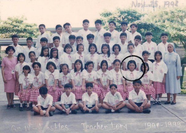 Class photo of school children in uniform.