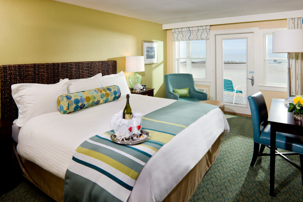 Guestroom in a vintage hotel in Cape Cod overlooking the seashore.