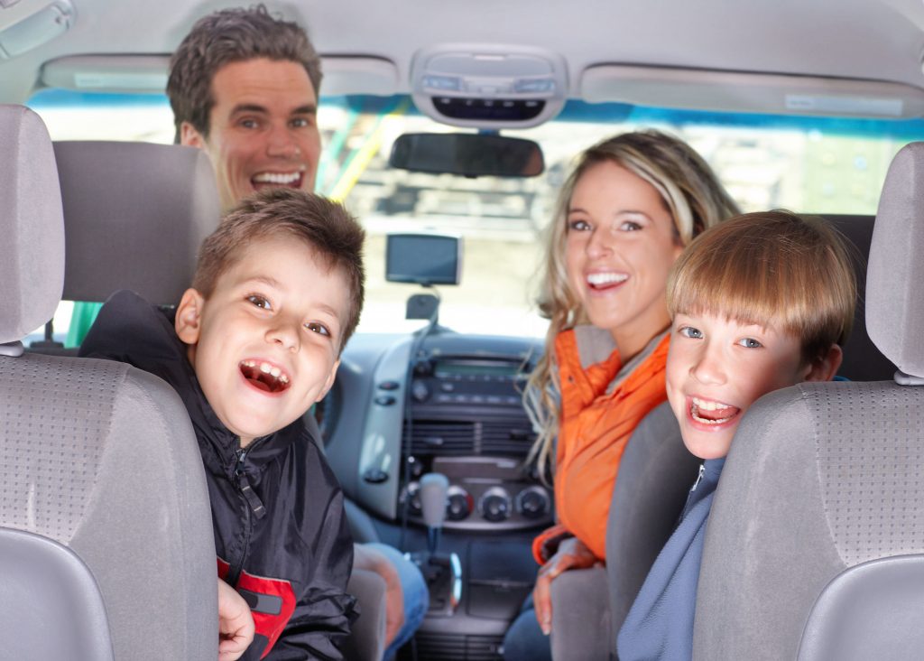 family in car