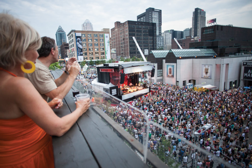 Montreal Jazz Fest crowds enjoying free concerts in the city.