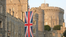 Windsor Castle with the British flag welcoming visitors.