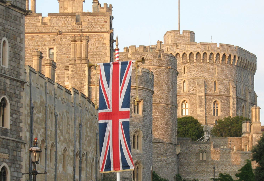 Windsor Castle with the British flag welcoming visitors.