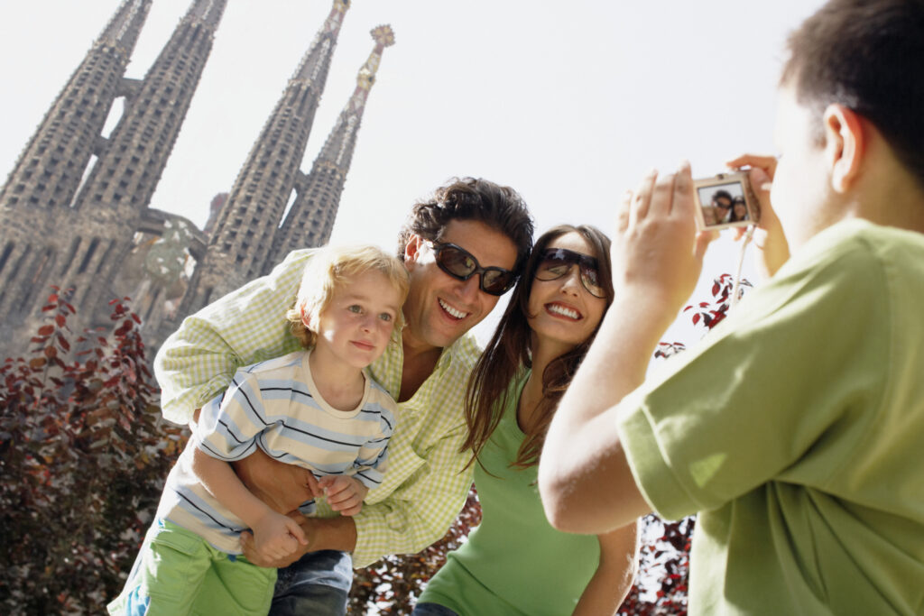 Family in front of Church of Sagrada Familia, Barcelona