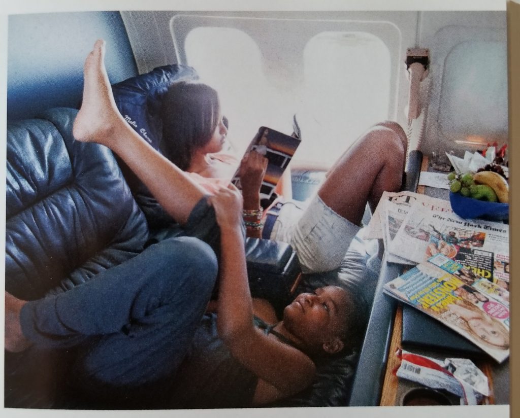 Sasha and Malia Obama traveling with their mom to work on "Bright Star" the First Lady's private plane. Photo from "Becoming Michelle Obama."