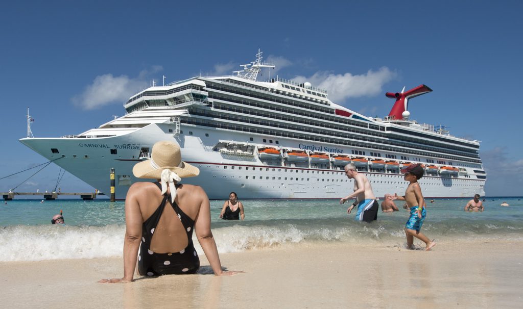 Grand Turk beach with Carnival Sunrise ship in the background.