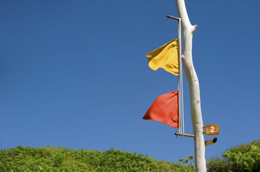 A flag pole is the efficient low-tech message system between staff and guests.