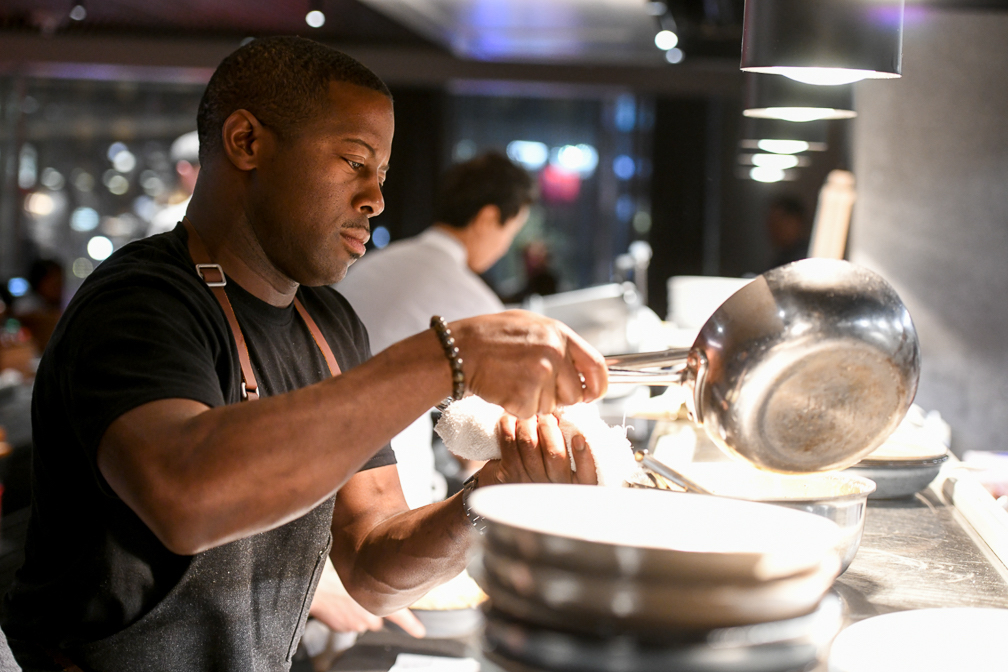 Chef Edouardo Jordan at work in a HAL cruise ship kitchen.