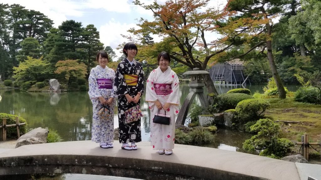 Kanazawa students in traditional kimonos at Kenroku-en Gardens.