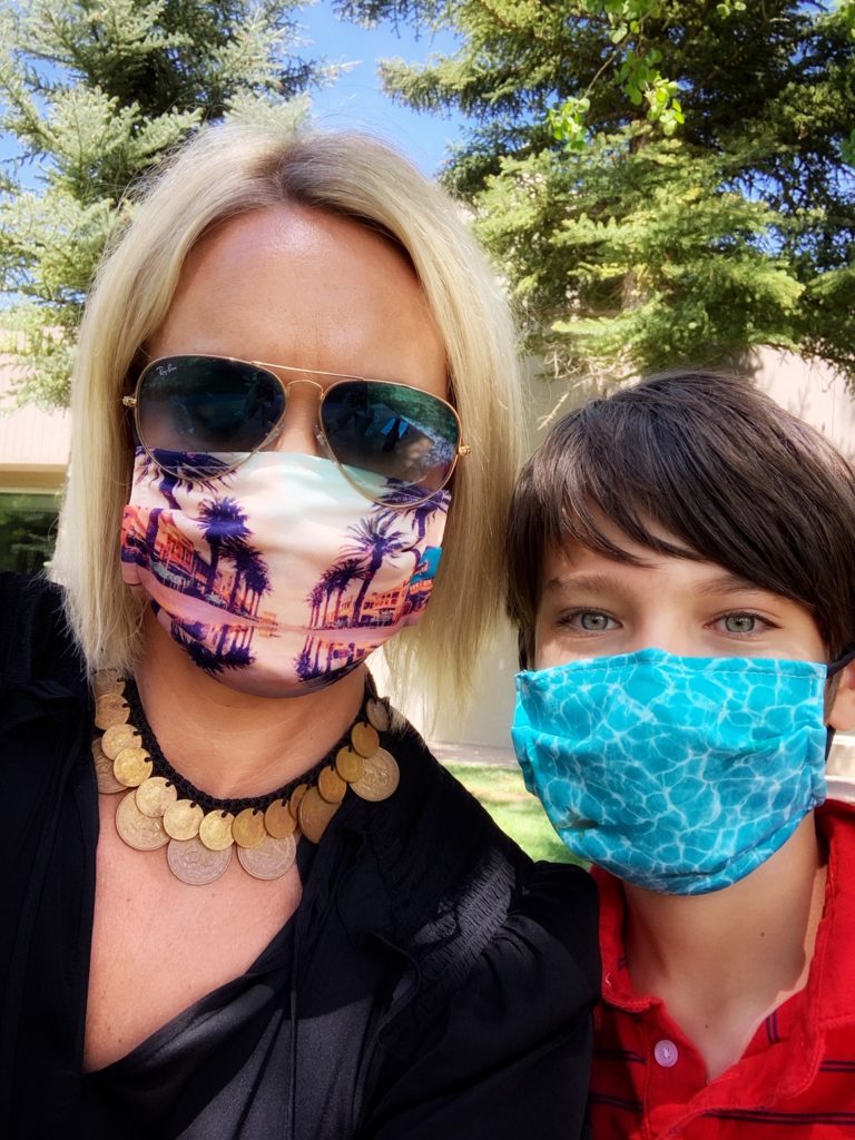 Mom and son in face masks.