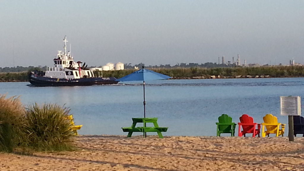 L'Auberge Resort beach on the bayou.