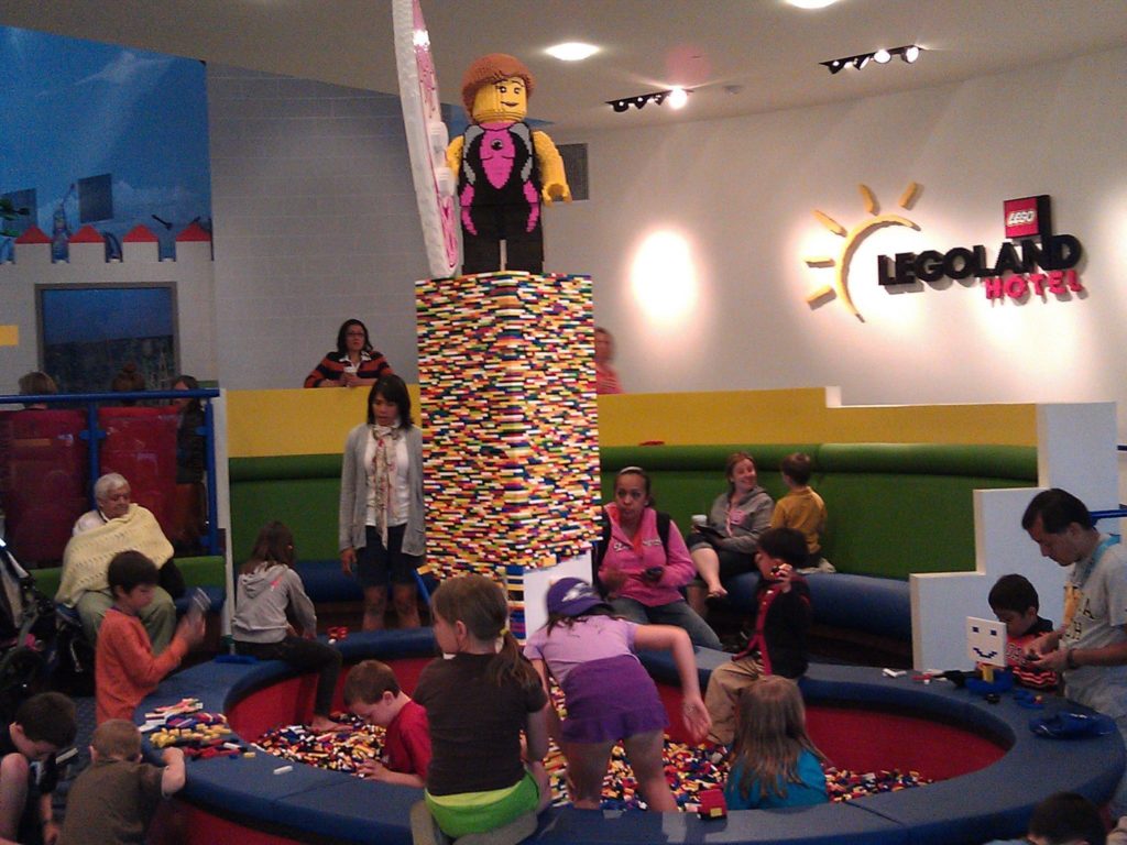 Crowds of kids at Legoland California hotel lobby.