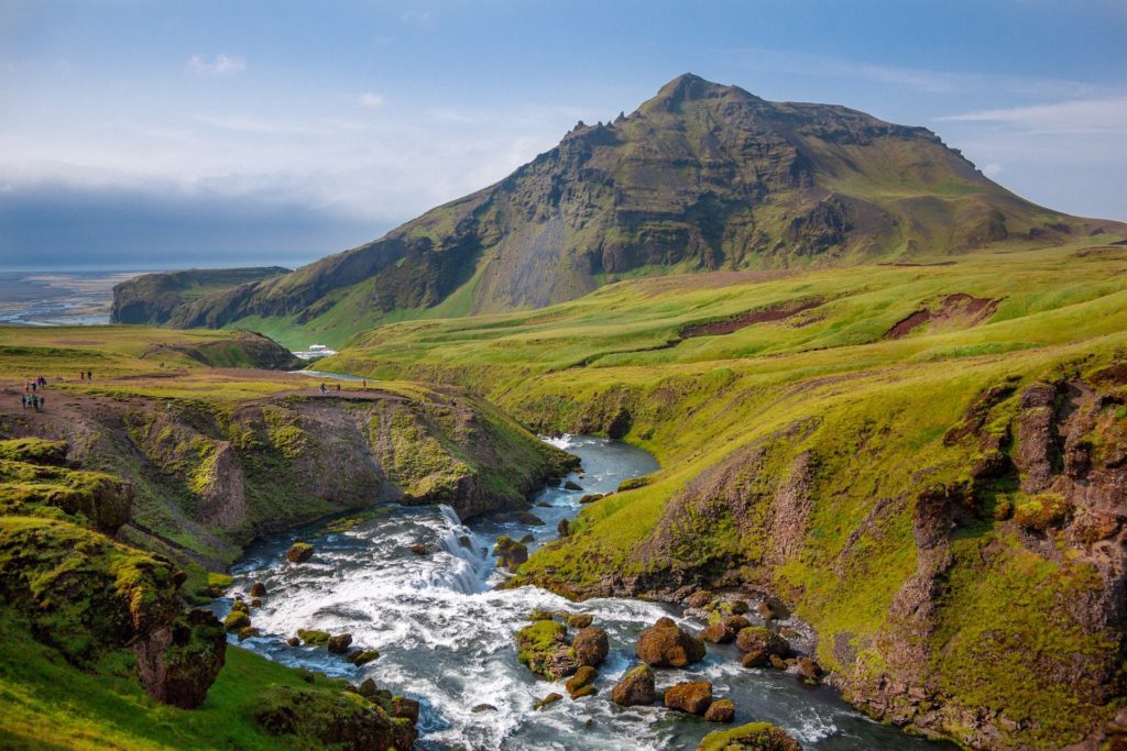 Rugged hills, lava deposits and grassy plains add to Iceland's scenic beauty.