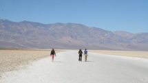 Hikers walking the Badwater Trail in Death Valley National Park.
