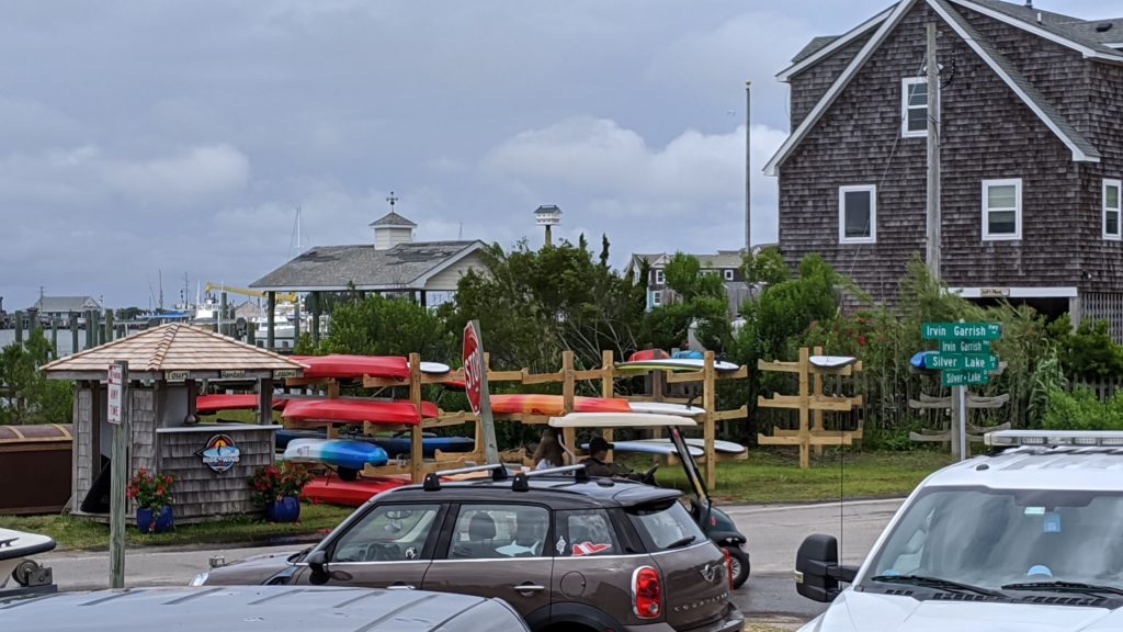 Cars and surfboards at the Ocracoke Harbor.