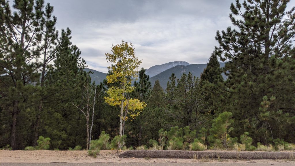 Snow capped Pikes Peak, 14,000+ feet, in the distance.