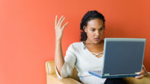 Frustrated woman at computer