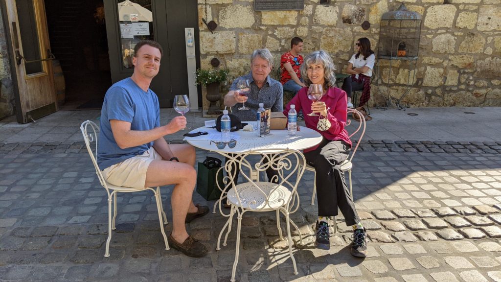 Three people tasting wine at Buena Vista Winery, Sonoma.