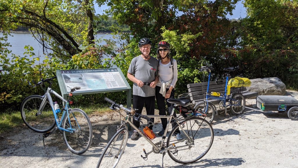 Two bike riders pause to read about the Lewis & Clark encampment along the Katy Trail on the Missouri River.