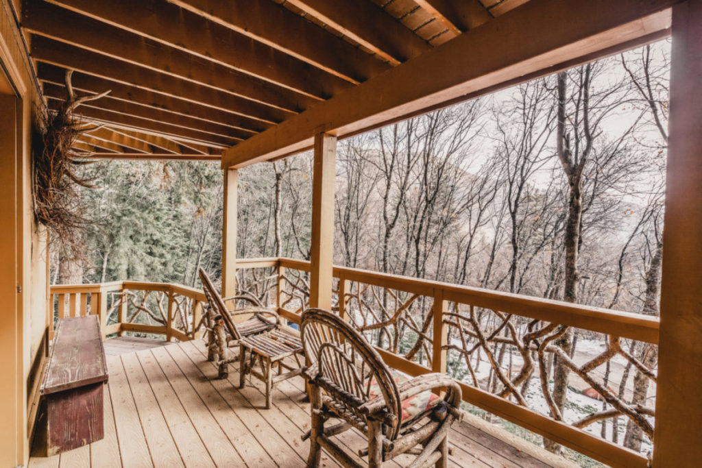 Deck of the three-story Sunstone Cabin at Sundance Mountain Resort.