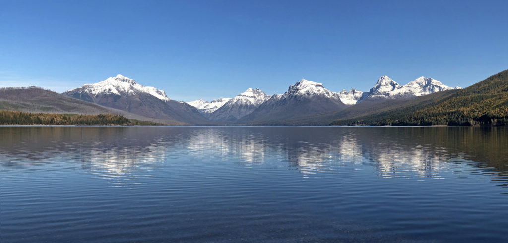 Natural vista of mountain views seen from Lake Apgar in Glacier National Park.