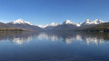 Natural vista of mountain views seen from Lake Apgar in Glacier National Park.