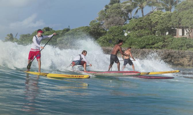 Oahu four men on standup paddleboards