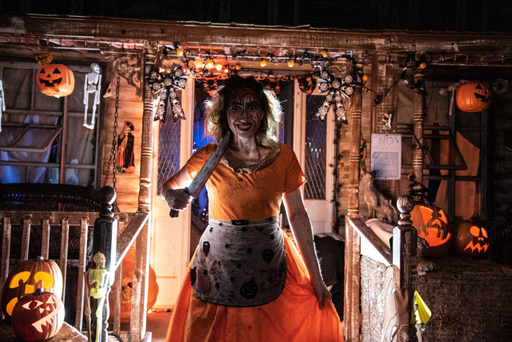 A crazed, knife-wielding housewife terrorizes the crowds at Hundred Acres Manor.