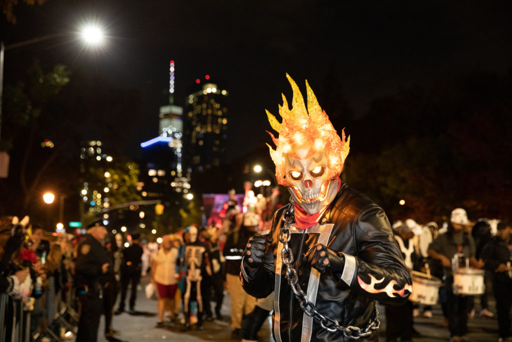 A blaze of fire costume marches in the famous Village Halloween Parade, West Village of Manhattan. Photo c. Walter Wlodarczyk/NYC & Company.