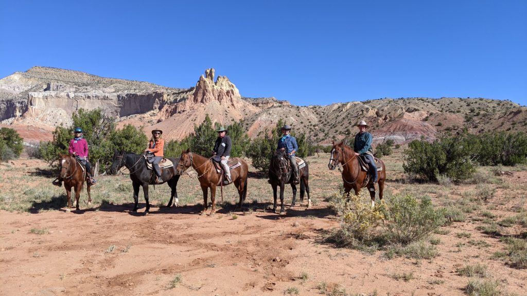 Group of horseback riders tour Ghost Ranch outside Taos to see the vistas that Georgia O'Keeffe painted while living on the ranch.