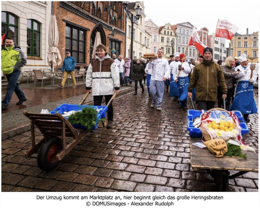 Fishers bring their fresh catch to the Wismar central square for the annual Herring Festival in Eastern Germany. Photo c DOMUSimages by Alexander Rudolph, Wismar Tourism.