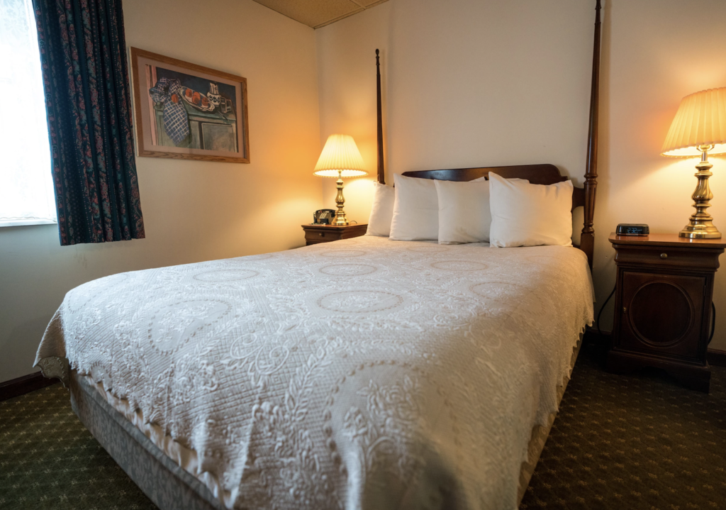 Queen bedded room at the historic Pollard Hotel on the main street of Red Lodge Montana.