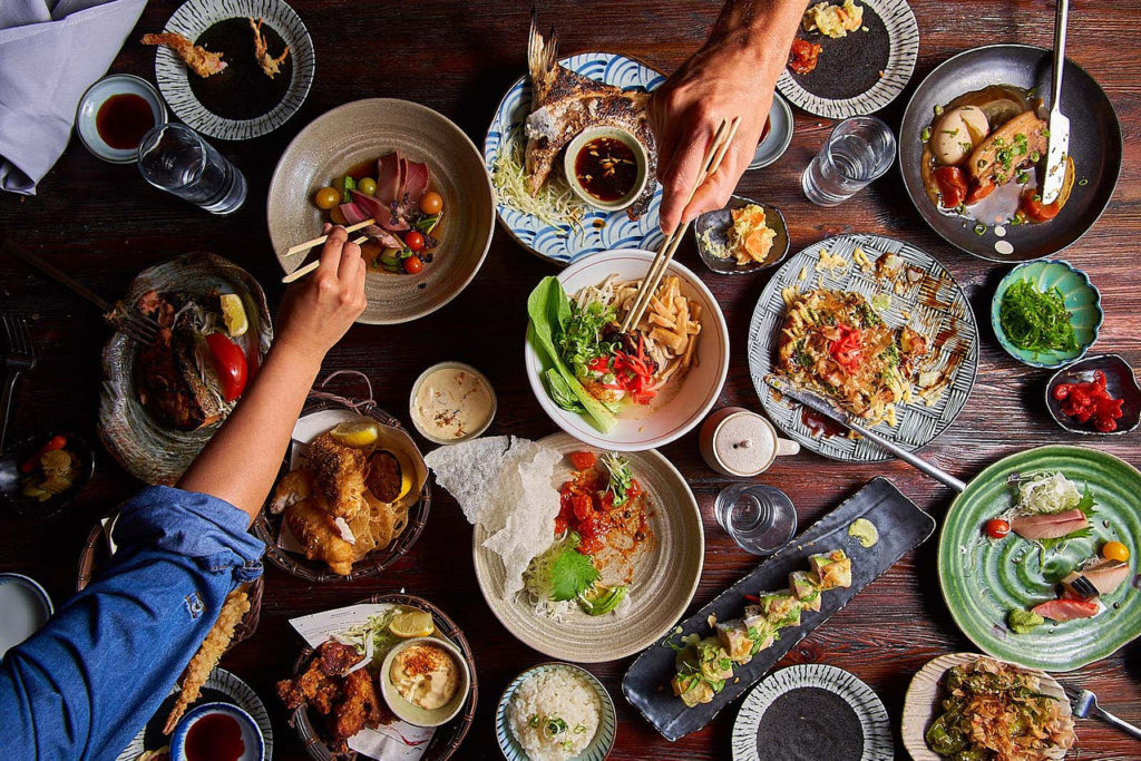 Share an Asian feast at the Dragonfly Robata Grill in Orlando, Florida.