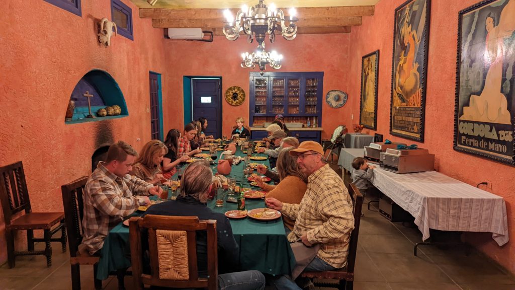 Family style dining, guests and ranch hands, at Rancho de la Osa in Arizona.