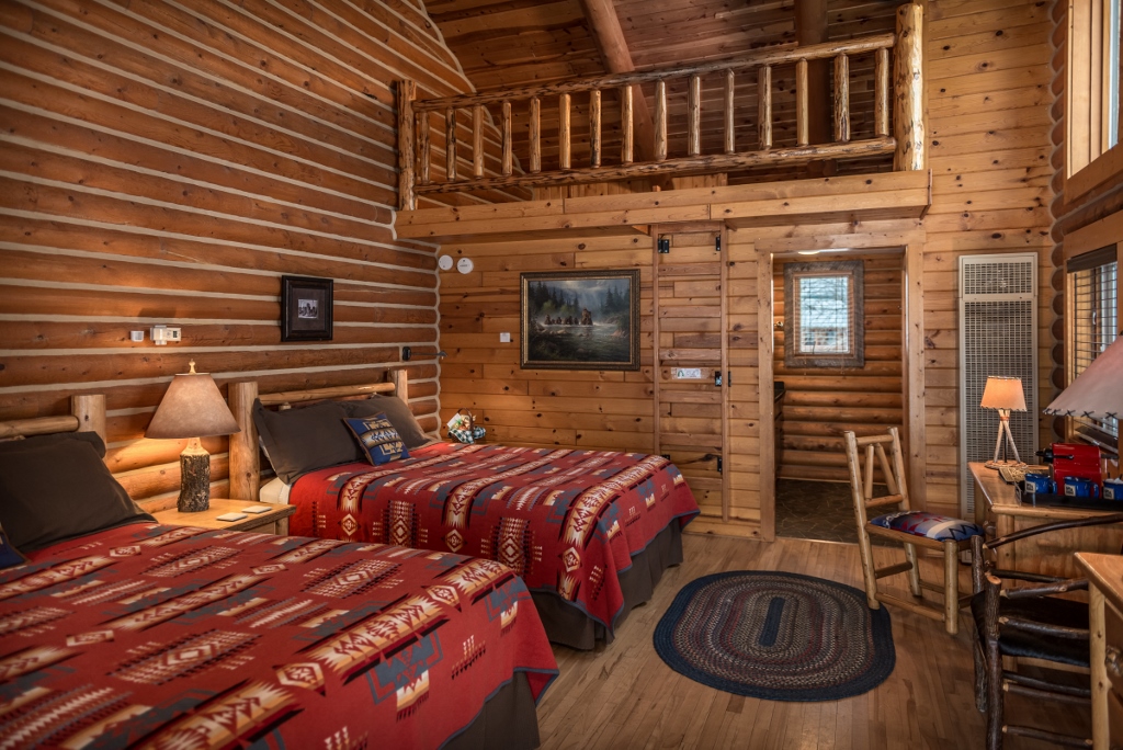 Ranch style guest bedroom at the Hideout at Flitner Ranch.
