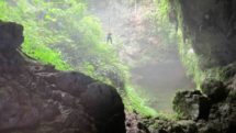 Rapelling down through a waterfall in the jungles of Puerto Rico.