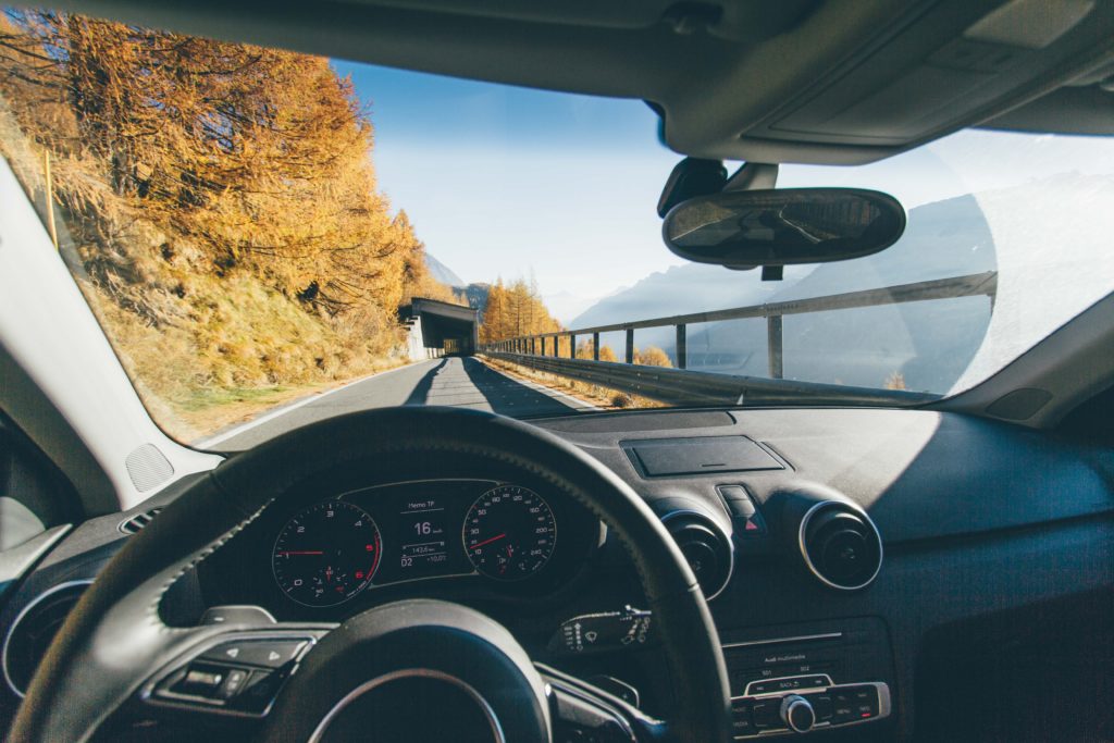 Looking over car dashboard to a tunnel on Blue Ridge Parkway.