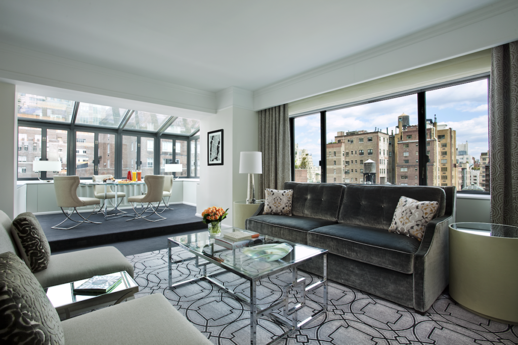 One of the larger Loews Regency New York Hotel suites, room 1403, with its own atrium overlooking the New York City skyline.