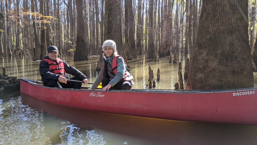 Couple canoeing in the swamps of Congaree National Park, South Carolina