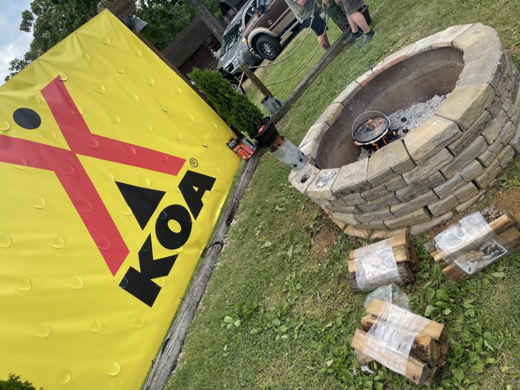 A firepit use and safety lesson is given at this KOA campground.