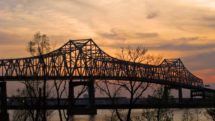 Spooky looking bridge at sunset leads to Baton Rouge.