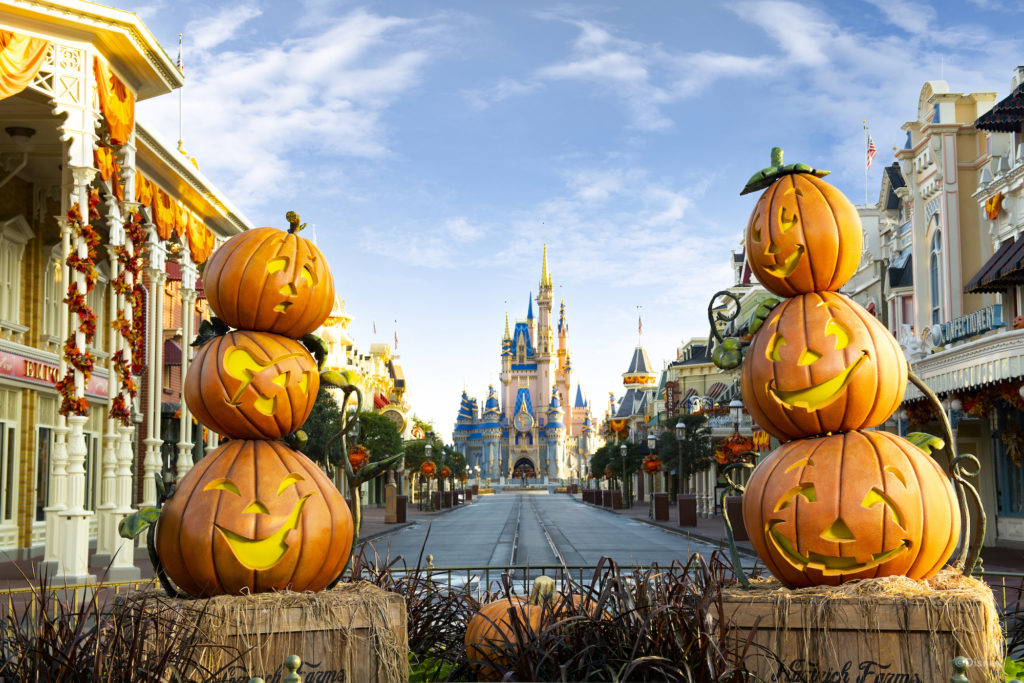 Carved pumpkins decorate the entry to Magic Kingdom during the festival fall season at Walt Disney World. Photo c. Disney