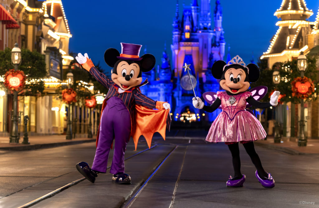 Mickey and Minnie Mouse are dressed in their new 50th Anniversary EARidescent Halloween costumes during fall season at Walt Disney World Resort. Photo c. Disney