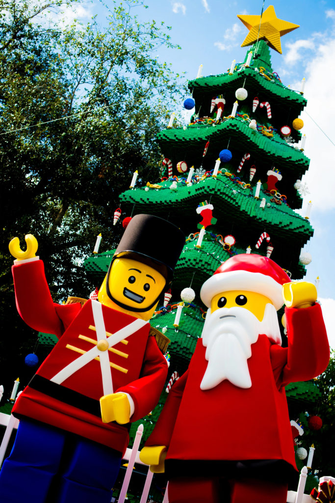 Holiday soldier with Santa and Christmas tree made of Legos at Legoland Resort, Florida.