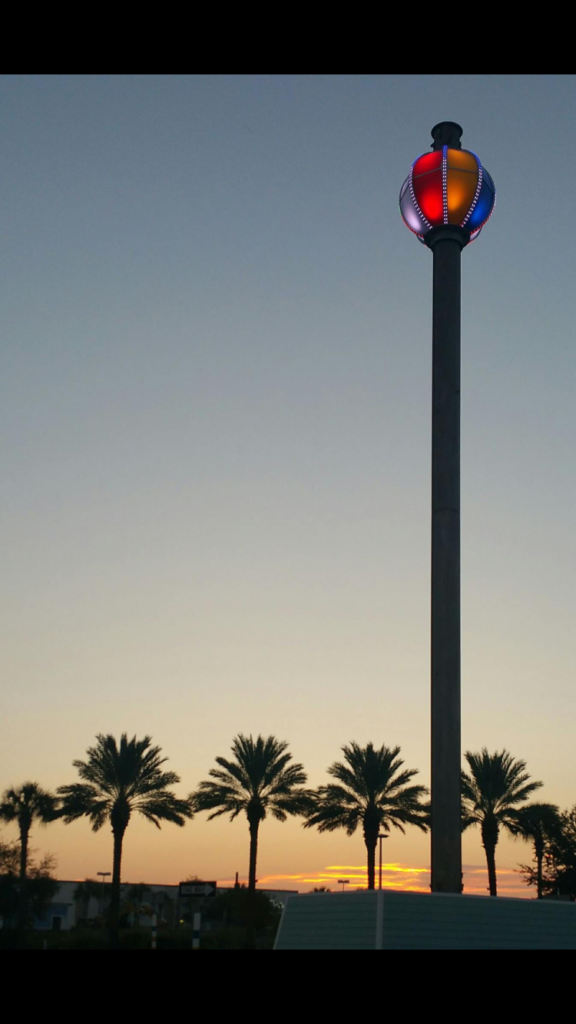 This illuminated beach ball on top of Celebration Tower in Panama City Beach, Florida is lowered for the New Year's Eve countdown. Photo c. Panama City Beach