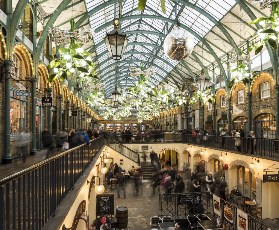 Covent Garden is festooned with Christmas ornaments at the holidays. Photo by Ben Pipe Photography for London Partners.