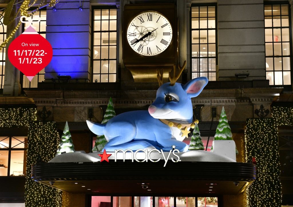 Entrance to Macy's Herald Square welcomes all to holiday decorations and festive animated windows.