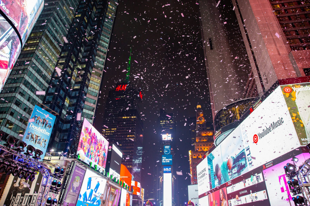 Shower of confetti full of holiday wishes rains down on Times Square, New York City, on New Year's Eve of 2021. Photo by Ian Hardy c. Countdown Entertainment.