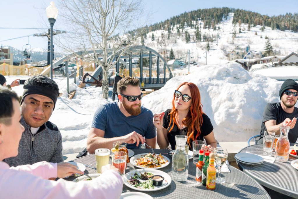 Couples dine outdoors at Bridge Cafe in Park City Utah.