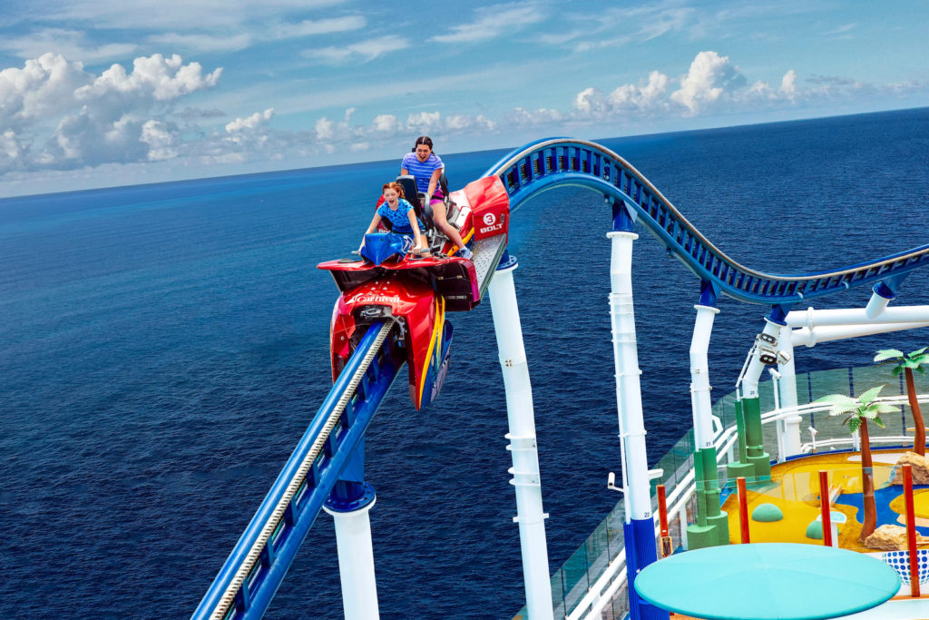 Two women aboard the BOLT coaster on the top deck of the Carnival Mardi Gras cruise ship.
